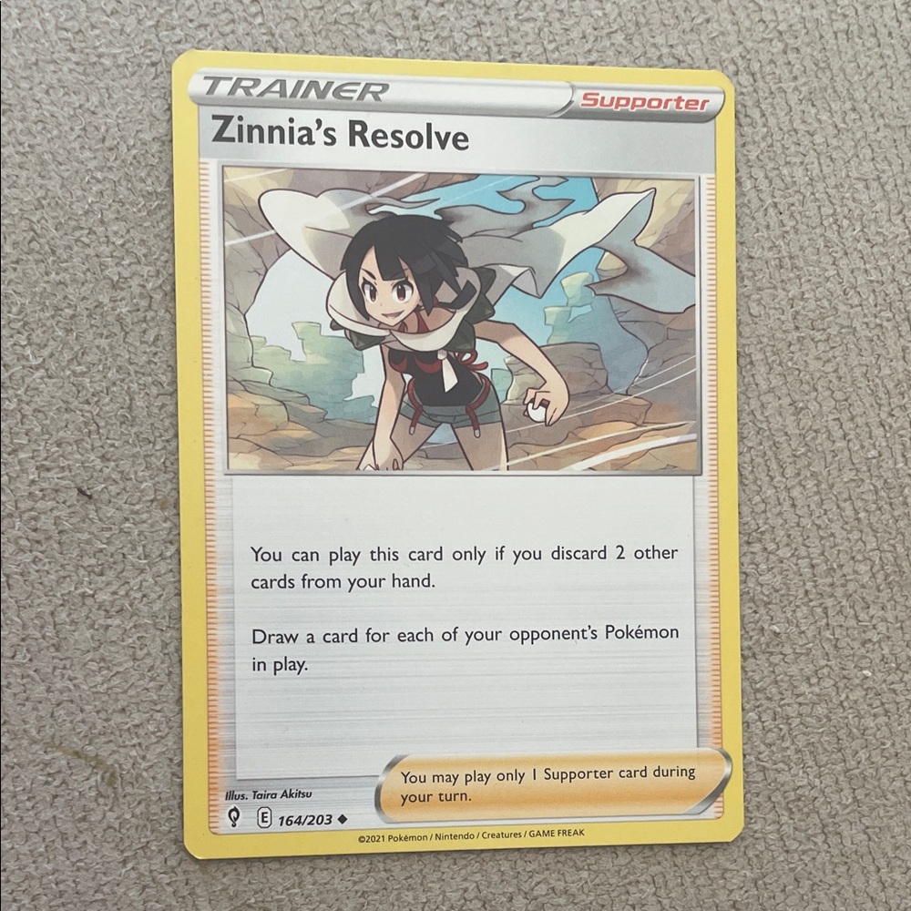 Zinnia's Resolve Trainer Card